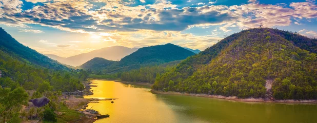 Deurstickers View of the lake at sunset. Panorama landscape © Olga Khoroshunova