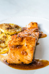 Grilled Salmon with Honey Glaze, Burnt Butter and Baked Potatoes.