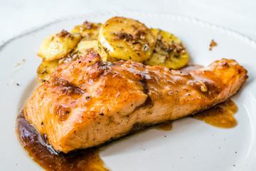 Grilled Salmon with Honey Glaze, Burnt Butter and Baked Potatoes.