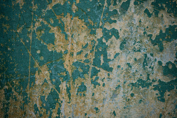 Texture of an old wall covered with paint. Background image of a worn paint coated surface