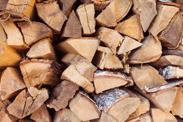 A neatly folded log of chopped wood. Country life.