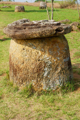 Ancient stone jar with an upper cover at the Plain of Jars (Site #1) near Phonsavan, Xiangkhouang province, Laos