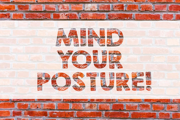 Conceptual hand writing showing Mind Your Posture. Business photo showcasing placing both hands on...