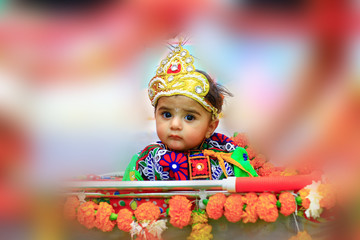 Indian Little child wearing Lord Krishna  costume and celebration Janmashtami festival