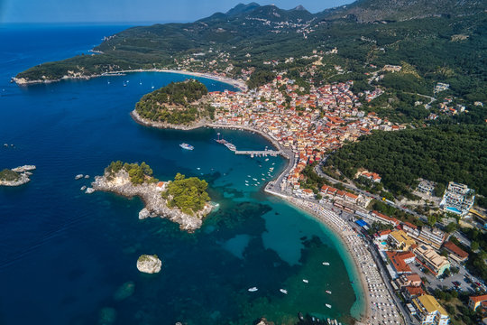 Aerial cityscape view of the coastal city of Parga, Greece during the Summer © ververidis