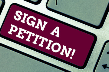 Writing note showing Sign A Petition. Business photo showcasing Support a cause by signing paper with an agreement Keyboard key Intention to create computer message pressing keypad idea