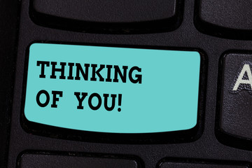 Handwriting text Thinking Of You. Concept meaning To have somebody on mind remembering a...
