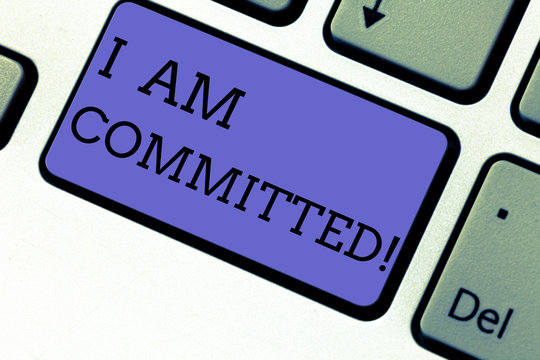 Conceptual hand writing showing I Am Committed. Business photo showcasing To be engage with a cause or someone in particular Commitment Keyboard key Intention to create computer message idea