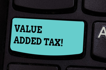 Handwriting text Value Added Tax. Concept meaning Amount of money added to cover production and...