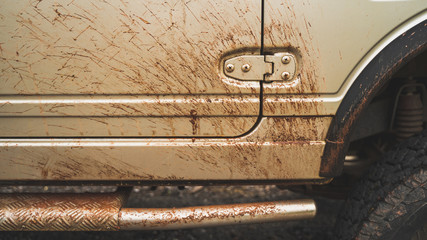 Off road vehicles that smear mud on the mountain trail