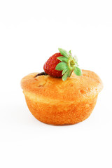 fresh sponge cake with strawberry decoration on a white background