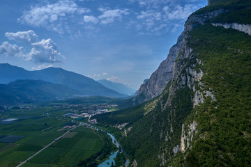 Mountain cold fresh water of turquoise color on a background of alpine mountains. Photo taken on a drone.