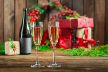 champagne in transparent glasses and a bottle (New Year's atmosphere, Christmas ) happy holidays! top. food background. copy space