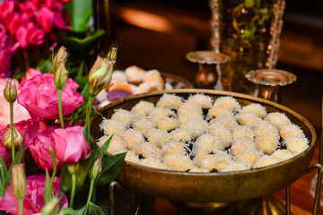 sweets with flowers, condensed milk candy balls, candy balls