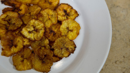 fried banana on white plate, ingredient of 