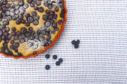 blueberry cake on a white tablecloth