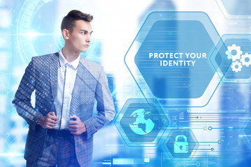 The concept of business, technology, the Internet and the network. A young entrepreneur working on a virtual screen of the future and sees the inscription: Protect your identity