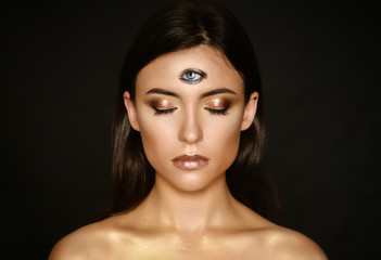 Woman with third eye on head - supernatural sense concept.