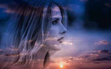 Double exposure of young woman and sunset sky.
