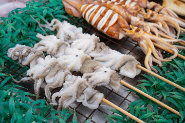 local BBQ grilled squid, Thai street food