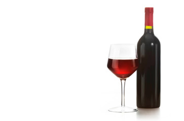 Glass of red wine and a bottle