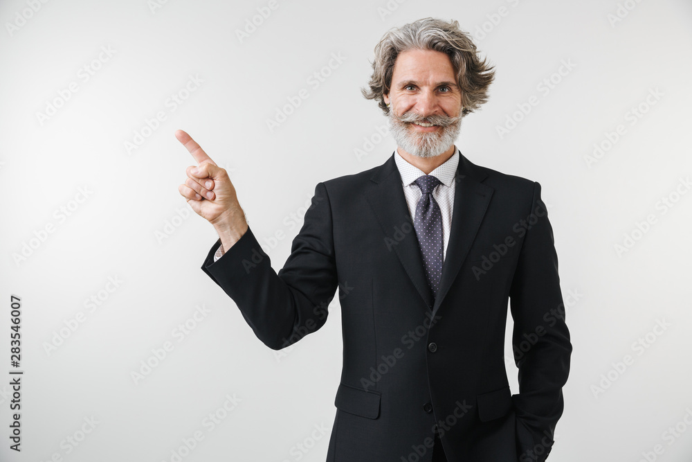 Wall mural smiling confident mature businessman wearing suit