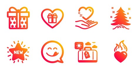 Hold heart, Travel luggage and Gift box line icons set. New star, Christmas tree and Romantic gift signs. Yummy smile, Heart flame symbols. Care love, Trip bag. Holidays set. Vector