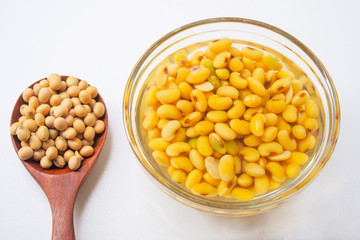 soaked soybean or soya bean in a glass bowl prepare for made soy milk or soya milk