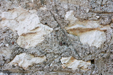 texture of concrete gray wall with large and small a stones