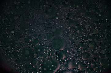 Abstract bubbles dark bokeh background