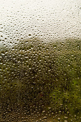 Wet windowpane in rain drops