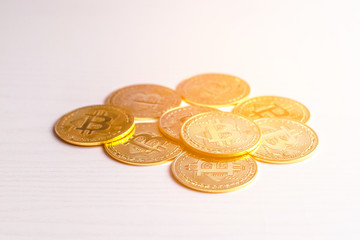 Golden Bitcoin and coins Virtual currency background.
