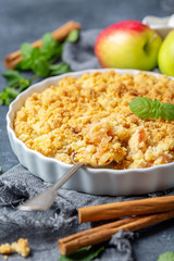 Apple crumble and a dessert spoon closeup.