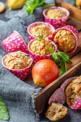 Homemade muffins with pears and muesli.