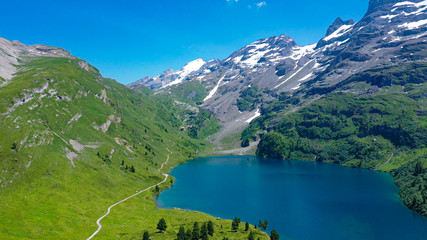 Naklejka na ściany i meble Romantic mountain lake in the Swiss Alps - amazing Switzerland from above