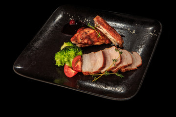 smoked meat slices and chicken pieces with vegetables