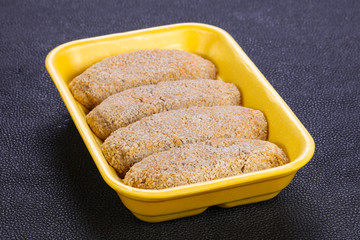 Raw chicken cutlet