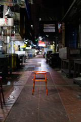 Red chair In a quiet The view has a mountain backdrop. Reservoir in the middle The forest is hot, humid, rainy.city