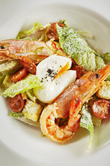 Caesar Salad with Shrimps, Chicken, Croutons, Tomatoes, Cucumbers