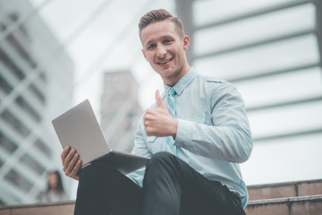 Young Business man successful with computer laptop working. Business office man happiness . Financial man business success freedom. Celebrate business concept.