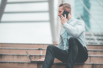 Young Business man successful with computer laptop working. Business office man happiness . Financial man business success freedom. Celebrate business concept.