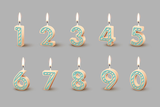 Birthday candles with burning flames isolated on gray background. Vector design elements.