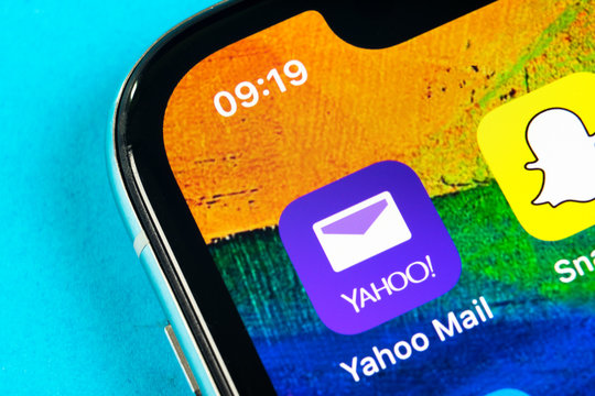 Helsinki, Finland, May 4, 2019: Yahoo Mail application icon on Apple iPhone X smartphone screen close-up. Yahoo mail app icon. Social network. Social media icon