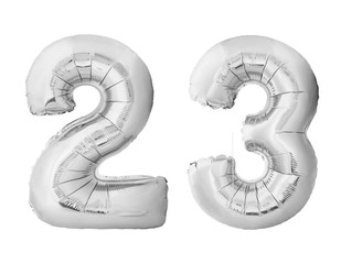 Number 23 twenty three made of silver inflatable balloons isolated on white background. Silver chrome helium balloons forming 23 twenty three number