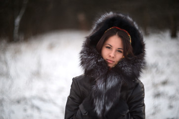 portrait of young woman in winter