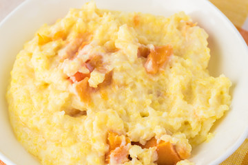 Organic polenta with milk and pumpkin.