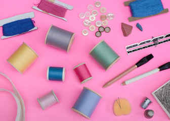 Flat lay view of various sewing supplies.