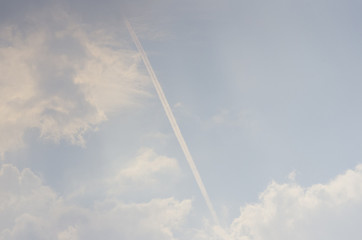 Naklejka na ściany i meble airplane contrail in the sky