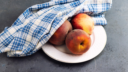 plate of fresh red peach