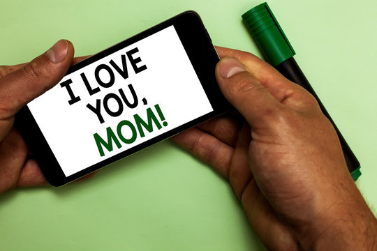 Writing note showing I Love You, Mom. Business photo showcasing Loving message emotional feelings affection warm declaration Human hand hold iPhone with texts touched green marker